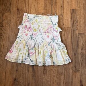 LoveShackFancy colorful smocked and tiered mini skirt